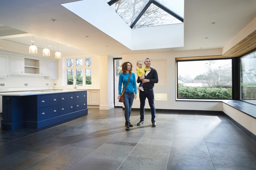 Happy family touring a potential home