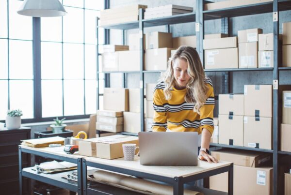 Small business owner looking at her inventory