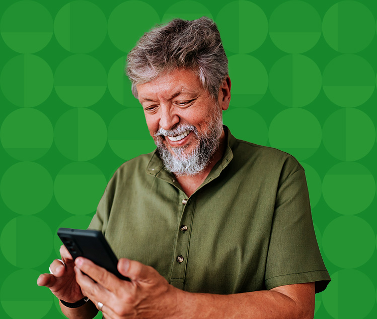 Elder man looking at his phone checking on his bank account