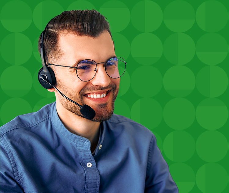 Young man with a headset on taking calls